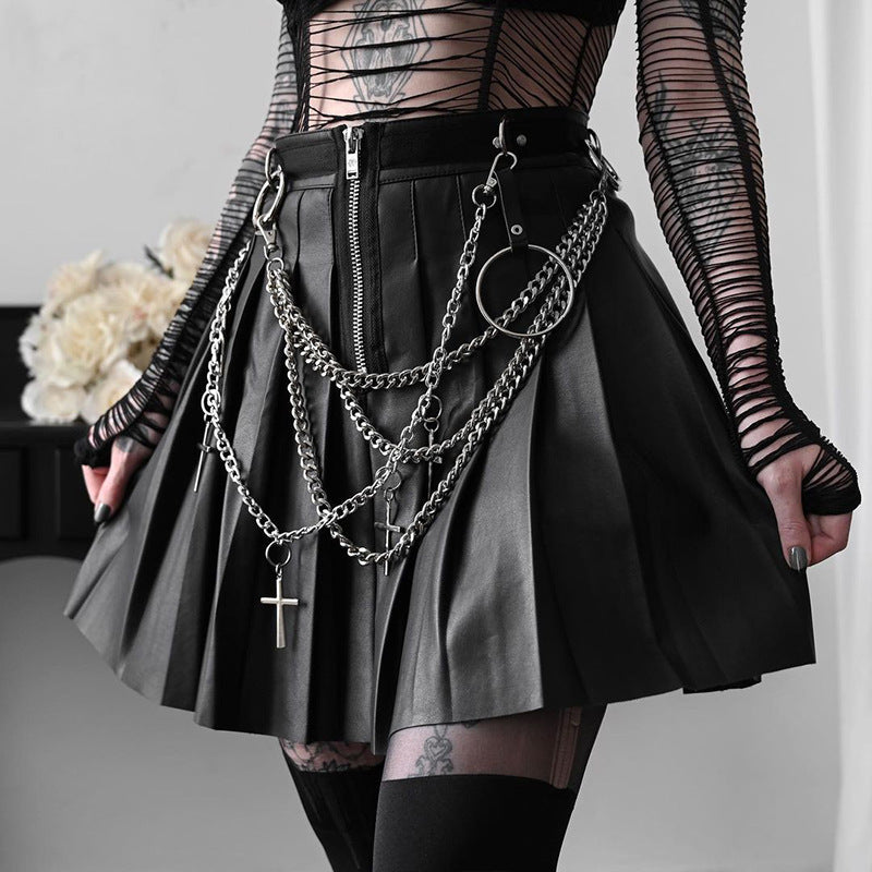 ACCESSORIZED PLEATED LEATHER SKIRT